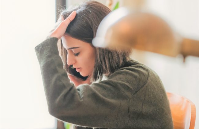 Woman has a stressful phone call