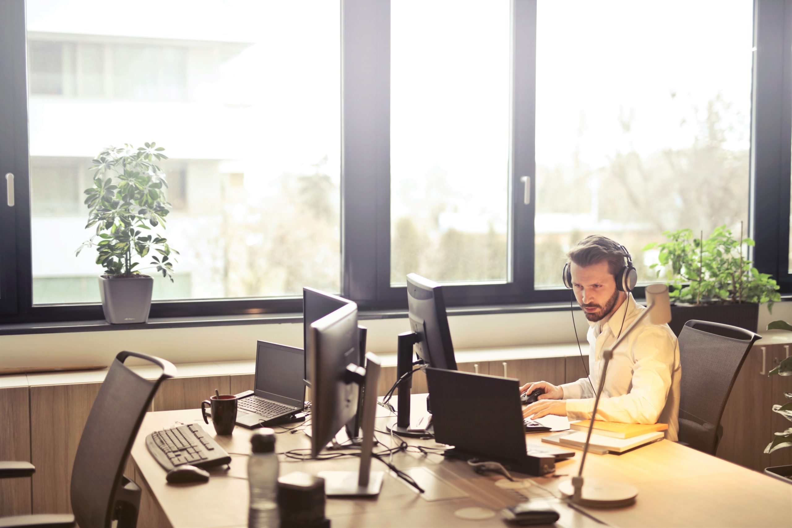 Man focused on his computer while working in the office