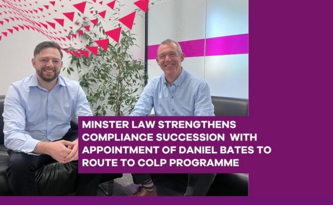 Two people seated on a black sofa in an office meeting room with a plant and glass wall behind them. A purple text overlay reads: “Minster Law strengthens compliance succession with appointment of Daniel Bates to route to COLP programme.”